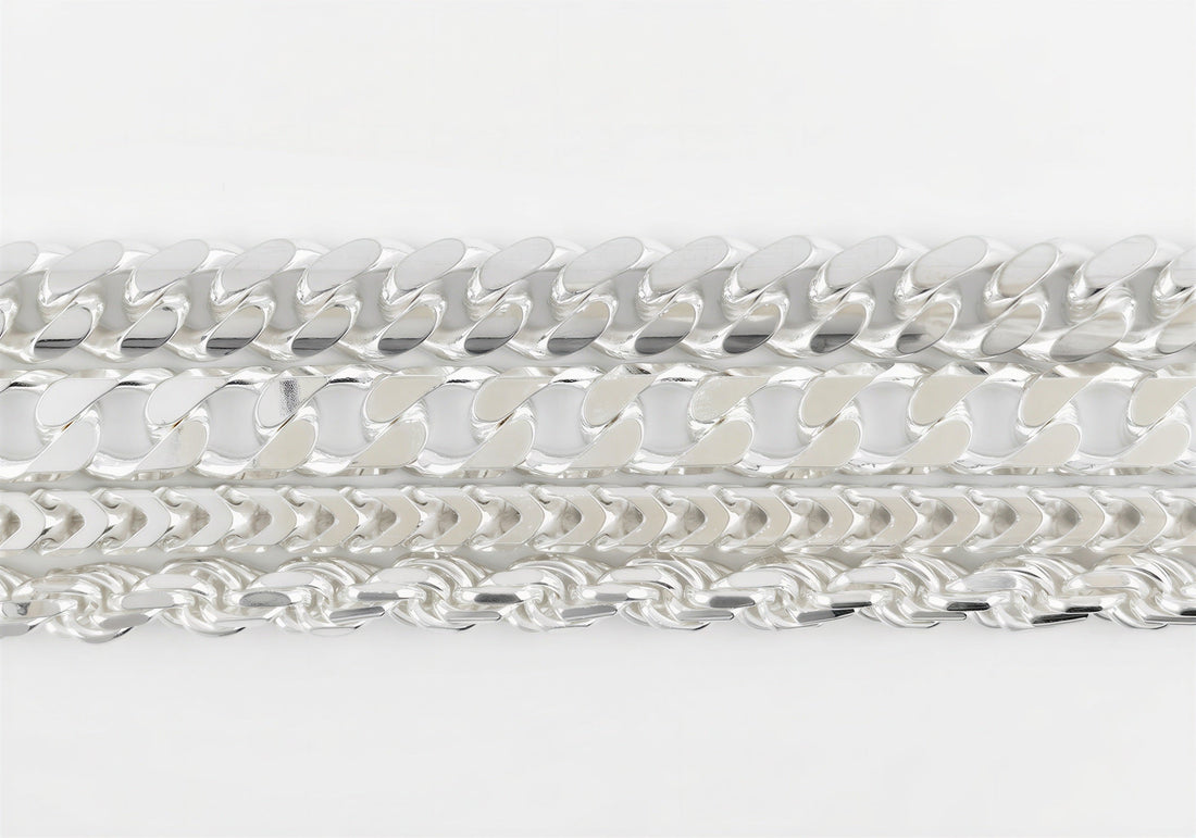 Cuban link, curb, Franco and rope chains in Neviera 925 sterling silver laid side by side, seen from above