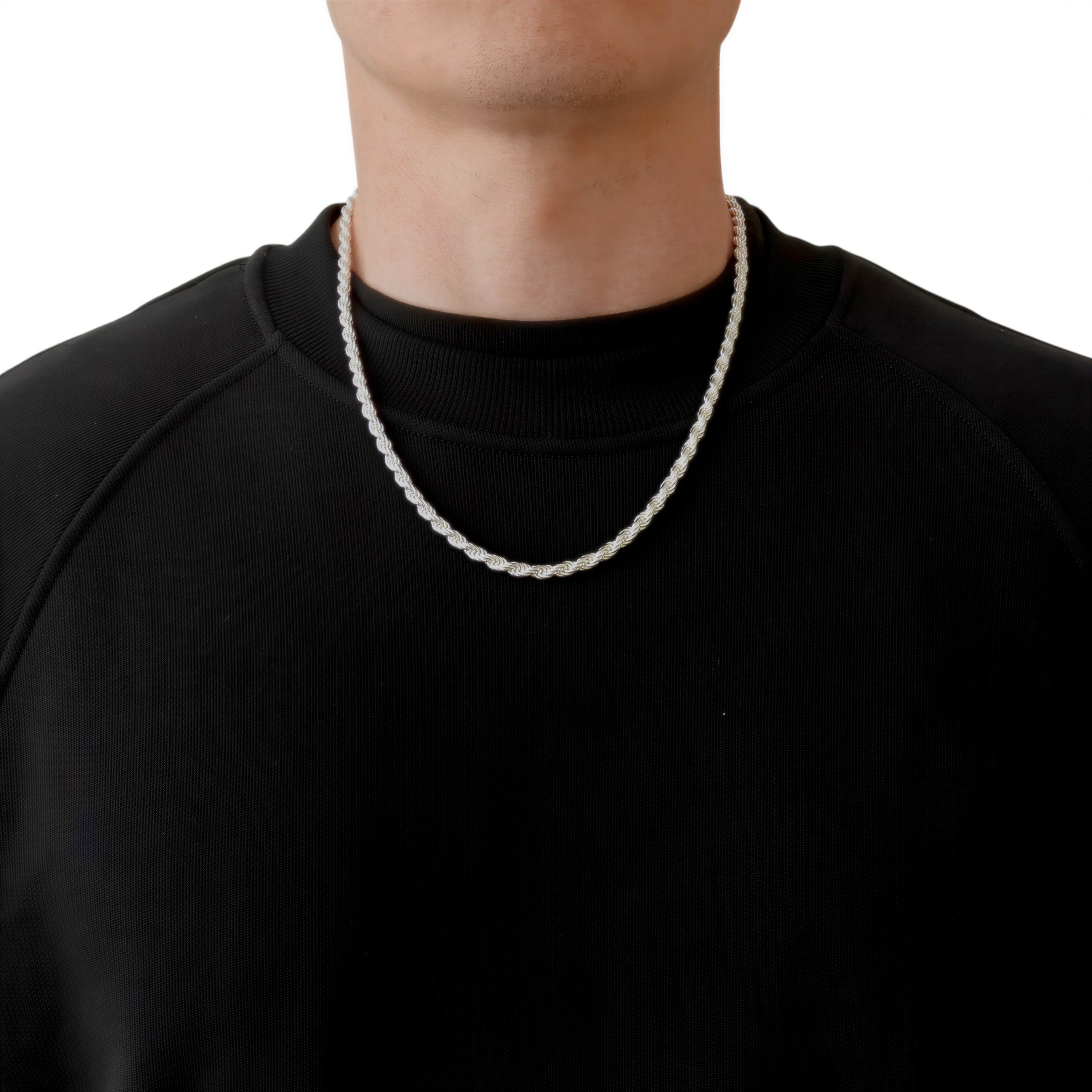 Neviera rope chain necklace — Italian-made 925 sterling silver, 55cm length, 4,6mm width. Lifestyle photograph on model wearing the chain with a black crew-neck sweatshirt on a neutral background. Neviera specializes in high-quality Italian-made 925 silver chain necklaces and bracelets.